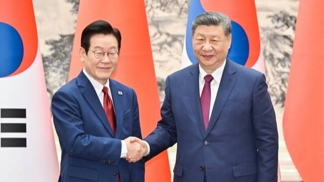 ཞི་ཅིན་ཕིང་གིས་ཧན་གོའི་སྲིད་འཛིན་དང་གྲོས་མོལ་གནང་།