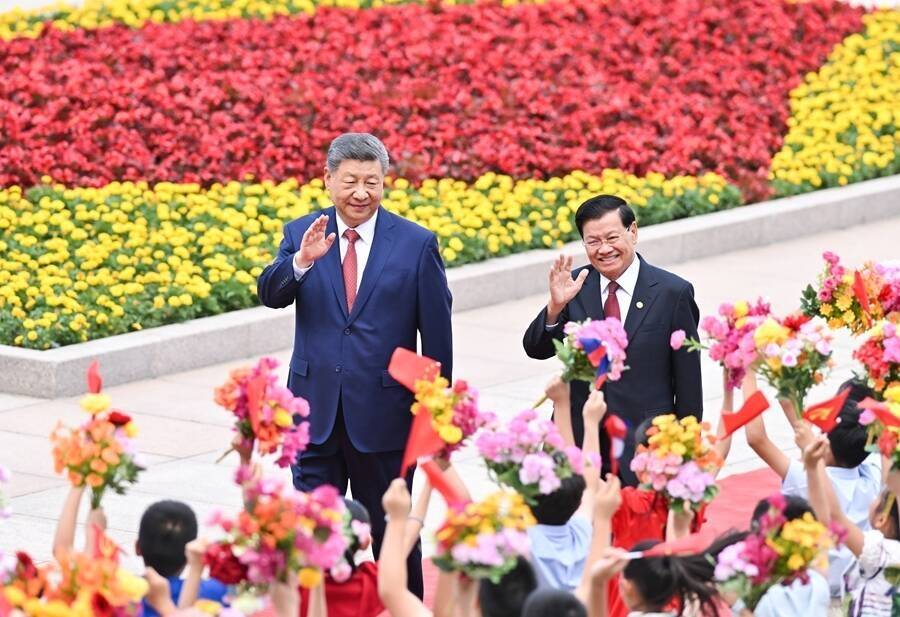 ཞི་ཅིན་ཕིང་གིས་ལའོ་ཝུའོ་མི་དམངས་གསར་བརྗེ་ཏང་ཀྲུང་དབྱང་གི་སྤྱི་ཁྱབ་ཧྲུའུ་ཅི།　 རྒྱལ་ཁབ་ཀྱི་ཀྲུའུ་ཞི་ཐུང་ལུན་དང་གྲོས་མོལ་མཛད།